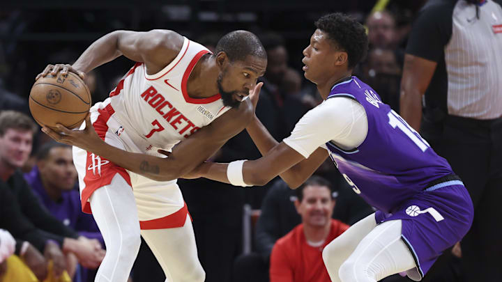Oct 8, 2025; Houston, Texas, USA; Houston Rockets forward Kevin Durant (7) controls the ball as Utah Jazz forward Ace Bailey (19) defends during the second quarter at Toyota Center. Mandatory Credit: Troy Taormina-Imagn Images Oct 8, 2025; Houston, Texas, USA; Houston Rockets forward Kevin Durant (7) controls the ball as Utah Jazz forward Ace Bailey (19) defends during the second quarter at Toyota Center. Mandatory Credit: Troy Taormina-Imagn Images
