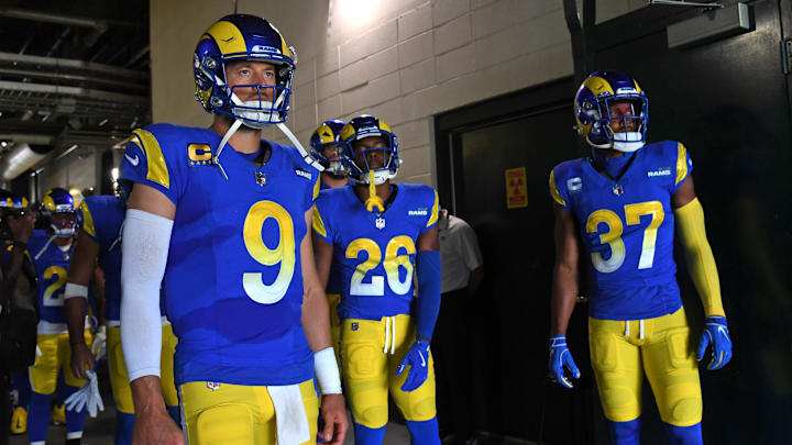 Sep 21, 2025; Philadelphia, Pennsylvania, USA; Los Angeles Rams quarterback Matthew Stafford (9), safety Kamren Kinchens (26) and safety Quentin Lake (37) wait in the tunnel against the Philadelphia Eagles at Lincoln Financial Field. Mandatory Credit: Eric Hartline-Imagn Images