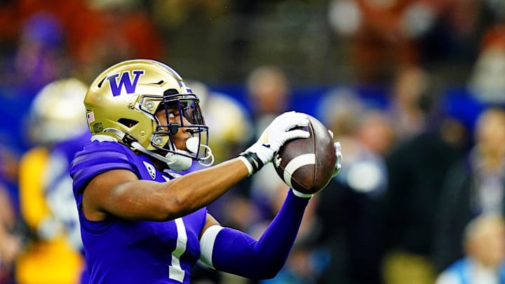 Jan 1, 2024; New Orleans, LA, USA; Washington Huskies wide receiver Rome Odunze (1) warms up before