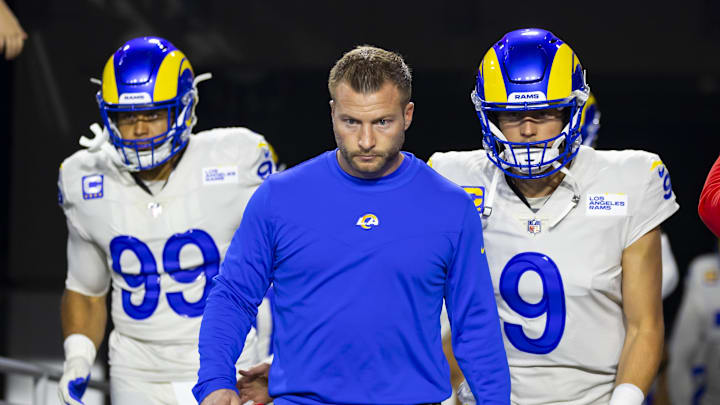 Dec 13, 2021; Glendale, Arizona, USA; Los Angeles Rams head coach Sean McVay with defensive tackle Aaron Donald (99) and quarterback Matthew Stafford (9) against the Arizona Cardinals at State Farm Stadium. Mandatory Credit: Mark J. Rebilas-Imagn Images