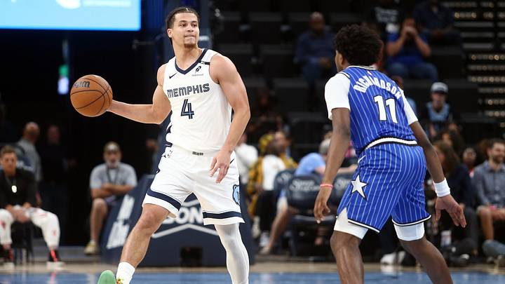 Oct 7, 2026; Memphis, Tennessee, USA; Memphis Grizzlies guard Walter Clayton Jr. (4) dribbles as Orlando Magic guard Jase Richardson (11) defends during the third quarter at FedExForum. Mandatory Credit: Petre Thomas-Imagn Images Oct 7, 2026; Memphis, Tennessee, USA; Memphis Grizzlies guard Walter Clayton Jr. (4) dribbles as Orlando Magic guard Jase Richardson (11) defends during the third quarter at FedExForum. Mandatory Credit: Petre Thomas-Imagn Images