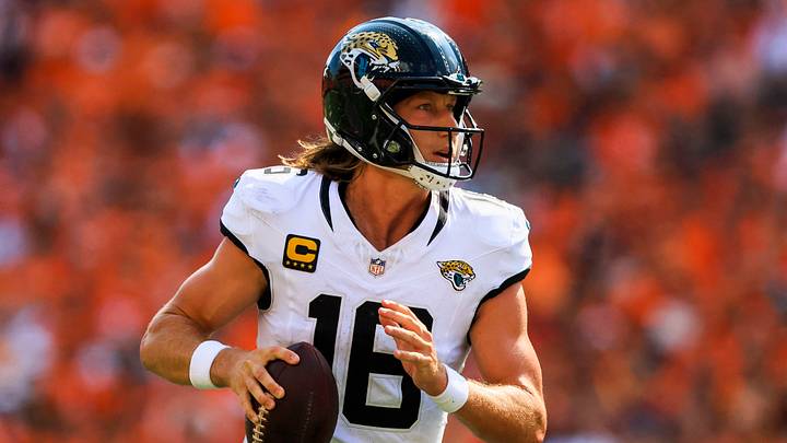 Sep 14, 2025; Cincinnati, Ohio, USA; Jacksonville Jaguars quarterback Trevor Lawrence (16) runs with the ball against the Cincinnati Bengals in the second half at Paycor Stadium. Mandatory Credit: Katie Stratman-Imagn Images