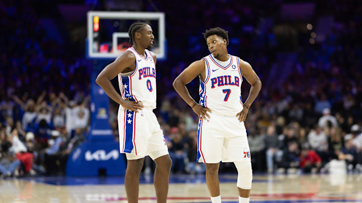 Nov 2, 2024; Philadelphia, Pennsylvania, USA; Philadelphia 76ers guard Tyrese Maxey (0) talks with guard Kyle Lowry (7) during the third quarter against the Memphis Grizzlies at Wells Fargo Center. Mandatory Credit: Bill Streicher-Imagn Images