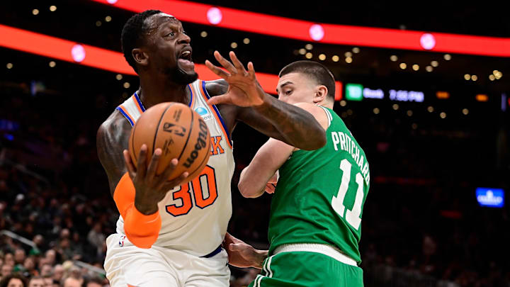 Dec 8, 2023; Boston, Massachusetts, USA;  New York Knicks forward Julius Randle (30) moves the ball  against Boston Celtics guard Payton Pritchard (11) during the first half at TD Garden. Mandatory Credit: Eric Canha-Imagn Images
