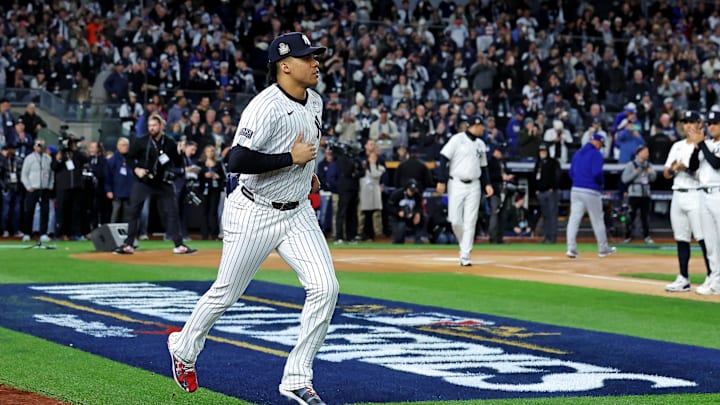 Oct 28, 2024; New York, New York, USA; New York Yankees outfielder Juan Soto (22) is introduced before playing against the Los Angeles Dodgers in game three of the 2024 MLB World Series at Yankee Stadium. Mandatory Credit: Brad Penner-Imagn Images