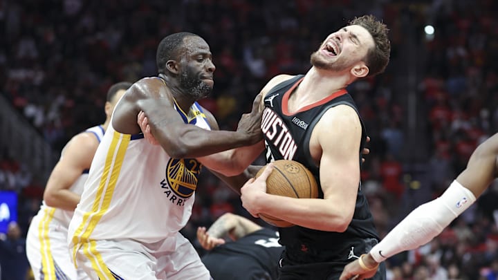 Dec 11, 2024; Houston, Texas, USA; Golden State Warriors forward Draymond Green (23) fouls Houston Rockets center Alperen Sengun (28) during the fourth quarter at Toyota Center. Mandatory Credit: Troy Taormina-Imagn Images Dec 11, 2024; Houston, Texas, USA; Golden State Warriors forward Draymond Green (23) fouls Houston Rockets center Alperen Sengun (28) during the fourth quarter at Toyota Center. Mandatory Credit: Troy Taormina-Imagn Images