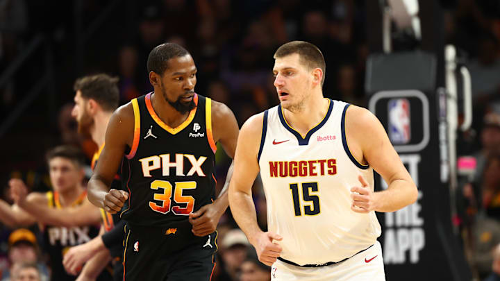 Phoenix Suns forward Kevin Durant (35) against Denver Nuggets center Nikola Jokic.