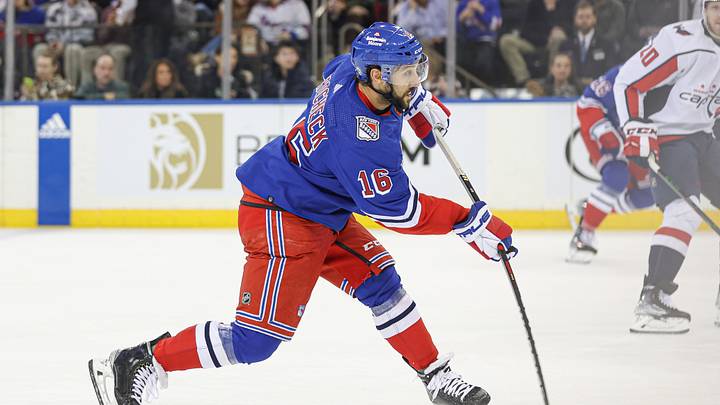 Dec 27, 2022; New York, New York, USA; New York Rangers center Vincent Trocheck (16) shoots the puck during the first period against the Washington Capitals at Madison Square Garden. Mandatory Credit: Vincent Carchietta-USA TODAY Sports