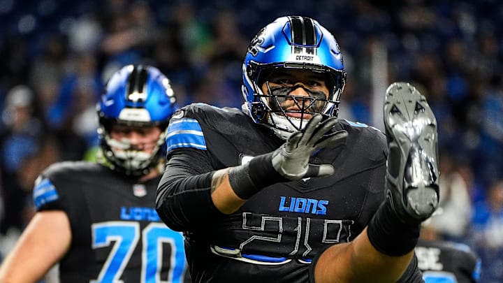 Detroit Lions offensive tackle Penei Sewell (58) warms up before the Seattle Seahawks game at Ford Field in Detroit on Monday, Sept. 30, 2024.
