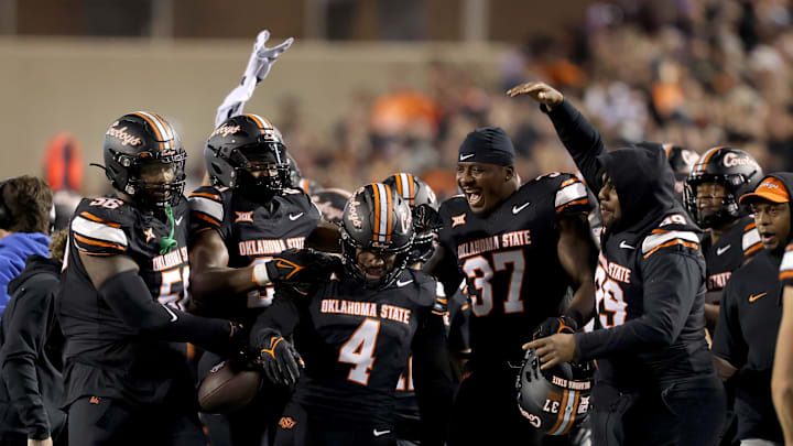 Oklahoma State's Nickolas Martin (4) celebrates an interception in the fourth quarter of the college football game between the Oklahoma State University Cowboys and the Kansas State Wildcats at Boone Pickens Stadium in Stillwater. Okla., Friday, Oct. 6, 2023. OSU won 29-21.