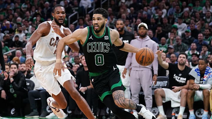 May 15, 2024; Boston, Massachusetts, USA; Boston Celtics forward Jayson Tatum (0) drives the ball against Cleveland Cavaliers forward Evan Mobley (4) in the third quarter during game five of the second round for the 2024 NBA playoffs at TD Garden. Mandatory Credit: David Butler II-Imagn Images May 15, 2024; Boston, Massachusetts, USA; Boston Celtics forward Jayson Tatum (0) drives the ball against Cleveland Cavaliers forward Evan Mobley (4) in the third quarter during game five of the second round for the 2024 NBA playoffs at TD Garden. Mandatory Credit: David Butler II-Imagn Images