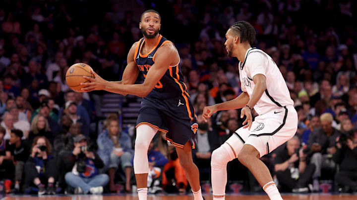 Nov 15, 2024; New York, New York, USA; New York Knicks forward Mikal Bridges (25) looks to pass the ball against Brooklyn Nets forward Ziaire Williams (1) during the fourth quarter at Madison Square Garden. Mandatory Credit: Brad Penner-Imagn Images Nov 15, 2024; New York, New York, USA; New York Knicks forward Mikal Bridges (25) looks to pass the ball against Brooklyn Nets forward Ziaire Williams (1) during the fourth quarter at Madison Square Garden. Mandatory Credit: Brad Penner-Imagn Images