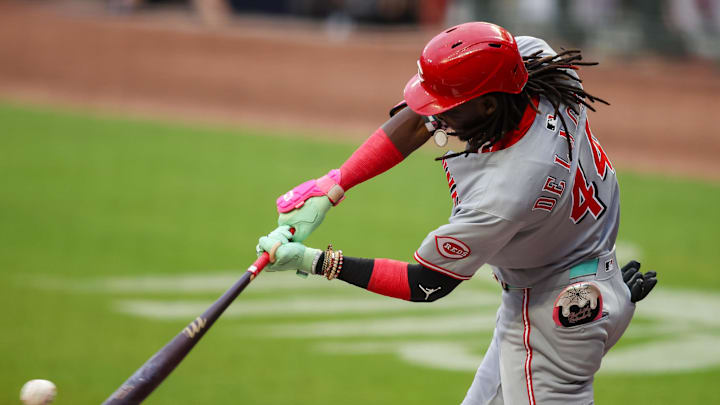 Cincinnati Reds shortstop Elly De La Cruz (44) hits a single against the Atlanta Braves in the first inning at Truist Park on May 7.
