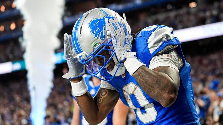 Detroit Lions running back Jahmyr Gibbs (0) celebrates a touchdown against New York Jets with wide receiver Isaac TeSlaa (18) during the second half at Ford Field in Detroit on Sunday, Sept. 27, 2026.