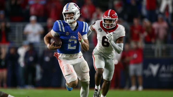 Nov 9, 2024; Oxford, Mississippi, USA; Mississippi Rebels quarterback Jaxson Dart (2) runs the ball during the second half against the Georgia Bulldogs at Vaught-Hemingway Stadium. Mandatory Credit: Petre Thomas-Imagn Images