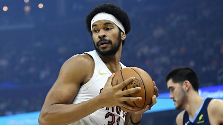 Nov 15, 2025; Cleveland, Ohio, USA; Cleveland Cavaliers center Jarrett Allen (31) rebounds in the first quarter against the Memphis Grizzlies at Rocket Arena. Mandatory Credit: David Richard-Imagn Images