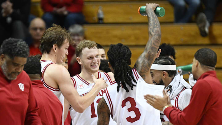 Nov 5, 2025; Bloomington, Indiana, USA; Indiana Hoosiers forward Tucker Devries (12) and Indiana Hoosiers guard Lamar Wilkerson (3) celebrate on the bench during the second half Alabama A&M Bulldogs at Simon Skjodt Assembly Hall. Mandatory Credit: Robert Goddin-Imagn Images