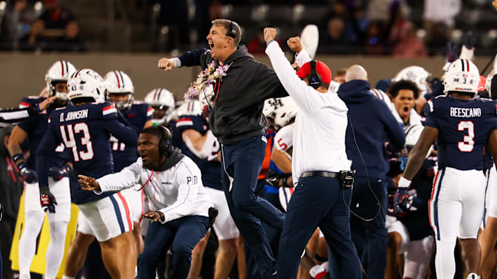 Nov 15, 2024; Tucson, Arizona, USA; Arizona Wildcats head coach Brent Brennan celebrates a interception made against the Houston Cougars during the second quarter at Arizona Stadium. Mandatory Credit: Aryanna Frank-Imagn Images