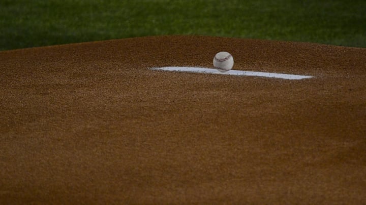 A view of an MLB baseball and the pitcher’s mound before the game between the Texas Rangers and the Arizona Diamondbacks at Globe Life Field. 