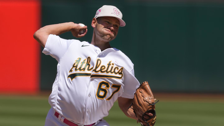 May 14, 2023; Oakland, California, USA; Oakland Athletics relief pitcher Garrett Acton (67) throws a pitch against the Texas Rangers during the seventh inning at Oakland-Alameda County Coliseum. Mandatory Credit: Darren Yamashita-Imagn Images May 14, 2023; Oakland, California, USA; Oakland Athletics relief pitcher Garrett Acton (67) throws a pitch against the Texas Rangers during the seventh inning at Oakland-Alameda County Coliseum. Mandatory Credit: Darren Yamashita-Imagn Images