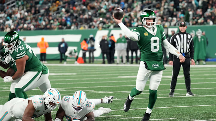 New York Jets quarterback Aaron Rodgers (8) throws his 500th career touchdown pass in the second quarter of the game against the Miami Dolphins on Jan. 5, 2025, in East Rutherford, N.J. New York Jets quarterback Aaron Rodgers (8) throws his 500th career touchdown pass in the second quarter of the game against the Miami Dolphins on Jan. 5, 2025, in East Rutherford, N.J.