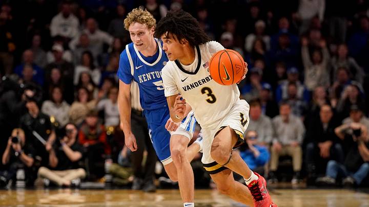 Vanderbilt guard Tyler Tanner (3) bolts past Kentucky guard Collin Chandler (5) during the second half at Memorial Gymnasium in Nashville, Tenn., Tuesday, Jan. 27, 2026.