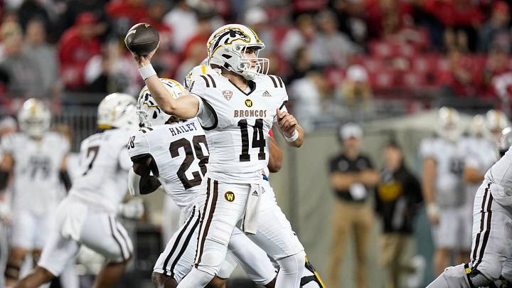Sep 7, 2024; Columbus, Ohio, USA;  Western Michigan Broncos quarterback Broc Lowry (14) throws a pass against the Ohio State Buckeyes during the second half at Ohio Stadium.  Mandatory Credit: Adam Cairns-Imagn Images