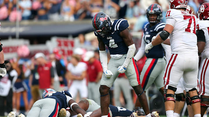 Oct 26, 2024; Oxford, Mississippi, USA; Mississippi Rebels linebacker Suntarine Perkins (4) reacts after a tackle during the second half against the Oklahoma Sooners at Vaught-Hemingway Stadium. Mandatory Credit: Petre Thomas-Imagn Images