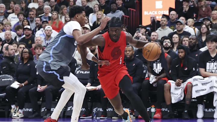 Feb 12, 2026; Salt Lake City, Utah, USA; Portland Trail Blazers guard Jrue Holiday (5) drives against Utah Jazz guard Ace Bailey (19) during the first half at Delta Center. Mandatory Credit: Rob Gray-Imagn Images Feb 12, 2026; Salt Lake City, Utah, USA; Portland Trail Blazers guard Jrue Holiday (5) drives against Utah Jazz guard Ace Bailey (19) during the first half at Delta Center. Mandatory Credit: Rob Gray-Imagn Images
