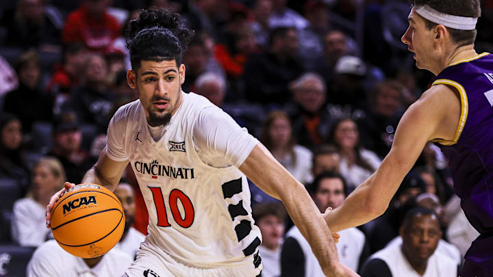 Dec 29, 2025; Cincinnati, Ohio, USA; Cincinnati Bearcats guard Shon Abaev (10) dribbles against the Lipscomb Bisons in the second half at Fifth Third Arena. Mandatory Credit: Katie Stratman-Imagn Images