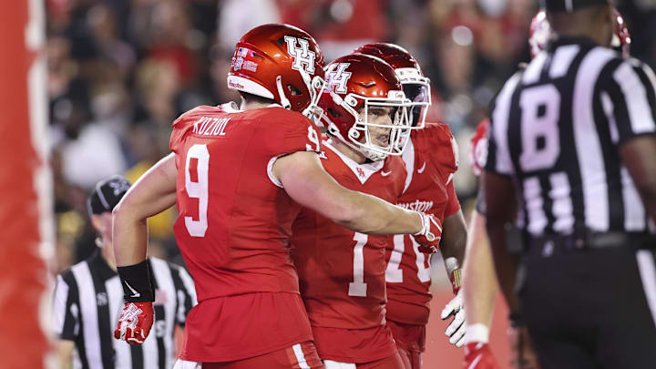 Sep 12, 2025; Houston, Texas, USA; Houston Cougars quarterback Conner Weigman (1) celebrates after running with the ball for a touchdown during the fourth quarter against the Colorado Buffaloes at TDECU Stadium. Mandatory Credit: Troy Taormina-Imagn Images Sep 12, 2025; Houston, Texas, USA; Houston Cougars quarterback Conner Weigman (1) celebrates after running with the ball for a touchdown during the fourth quarter against the Colorado Buffaloes at TDECU Stadium. Mandatory Credit: Troy Taormina-Imagn Images