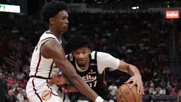 Nov 23, 2024; Houston, Texas, USA;Portland Trail Blazers guard Shaedon Sharpe (17) dribbles against Houston Rockets forward Amen Thompson (1) in the second half at Toyota Center. Mandatory Credit: Thomas Shea-Imagn Images