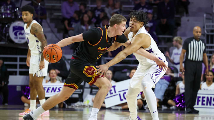 Kansas State forward Elias Rapieque plays defense against Louisiana Monroe's Renars Sondors during the second half at Bramlage Coliseum. 