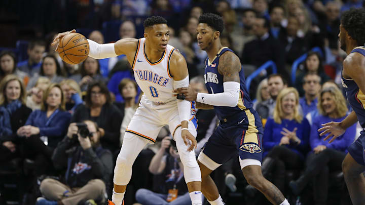 Oklahoma City Thunder guard Russell Westbrook (0) controls the ball against New Orleans Pelicans guard Elfrid Payton (4) during the first half at Chesapeake Energy Arena. 