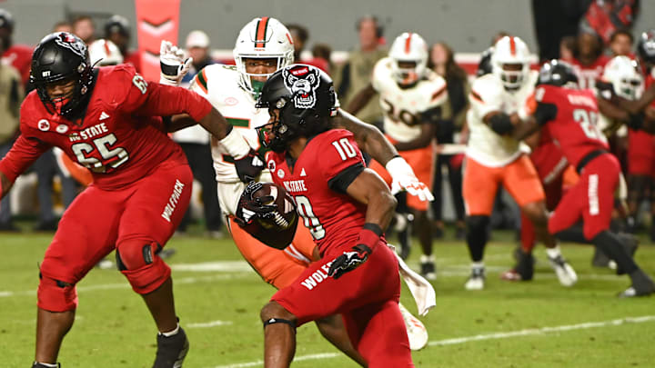 Nov 4, 2023; Raleigh, North Carolina, USA; North Carolina State Wolfpack receiver KC Concepcion (10) runs during the first half against the Miami Hurricanes at Carter-Finley Stadium. Mandatory Credit: Rob Kinnan-Imagn Images