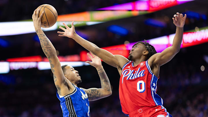 Apr 12, 2024; Philadelphia, Pennsylvania, USA; Philadelphia 76ers guard Tyrese Maxey (0) blocks the shot of Orlando Magic guard Markelle Fultz (20) during the second quarter at Wells Fargo Center. Mandatory Credit: Bill Streicher-Imagn Images Apr 12, 2024; Philadelphia, Pennsylvania, USA; Philadelphia 76ers guard Tyrese Maxey (0) blocks the shot of Orlando Magic guard Markelle Fultz (20) during the second quarter at Wells Fargo Center. Mandatory Credit: Bill Streicher-Imagn Images