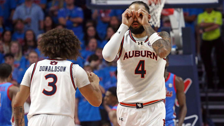 Feb 3, 2024; Oxford, Mississippi, USA; Auburn Tigers forward/center Johni Broome (4) reacts after an