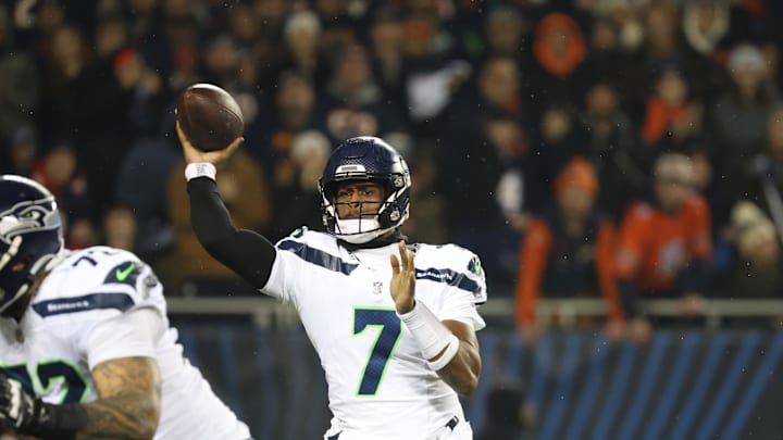 Dec 26, 2024; Chicago, Illinois, USA; Seattle Seahawks quarterback Geno Smith (7) throws a pass downfield during the first quarter against the Chicago Bears at Soldier Field.