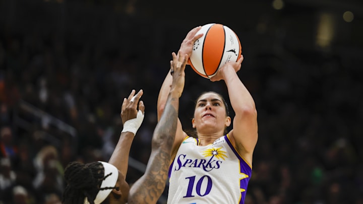 Sep 1, 2025; Seattle, Washington, USA; Los Angeles Sparks guard Kelsey Plum (10) shoots against the Seattle Storm during the fourth quarter at Climate Pledge Arena. Mandatory Credit: Joe Nicholson-Imagn Images