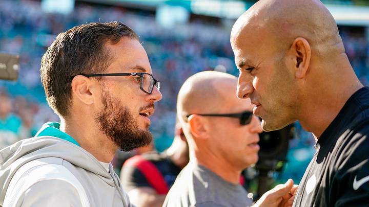 Miami Dolphins head coach Mike McDaniel speaks to New York Jets head coach Robert Saleh Miami Dolphins head coach Mike McDaniel speaks to New York Jets head coach Robert Saleh