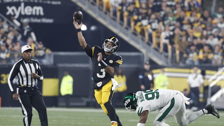 Oct 20, 2024; Pittsburgh, Pennsylvania, USA;  Pittsburgh Steelers quarterback Russell Wilson (3) passes against pressure from New York Jets defensive end Will McDonald IV (99) during the first quarter at Acrisure Stadium. Mandatory Credit: Charles LeClaire-Imagn Images