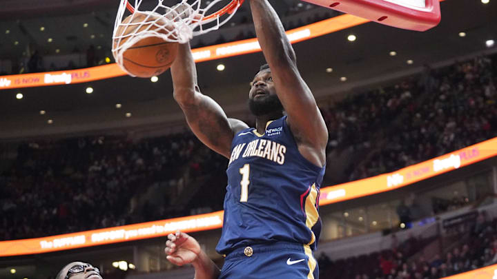 Jan 14, 2025; Chicago, Illinois, USA; New Orleans Pelicans forward Zion Williamson (1) dunks the ball on Chicago Bulls forward Jalen Smith (7) during the first quarter at United Center. Mandatory Credit: David Banks-Imagn Images