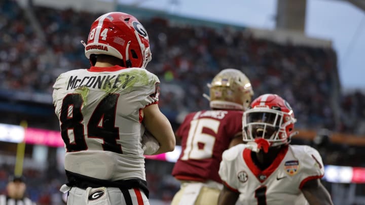 Dec 30, 2023; Miami Gardens, FL, USA; Georgia Bulldogs wide receiver Ladd McConkey (84) reacts after scoring a touchdown against the Florida State Seminoles during the first half in the 2023 Orange Bowl at Hard Rock Stadium. Mandatory Credit: Sam Navarro-USA TODAY Sports Dec 30, 2023; Miami Gardens, FL, USA; Georgia Bulldogs wide receiver Ladd McConkey (84) reacts after scoring a touchdown against the Florida State Seminoles during the first half in the 2023 Orange Bowl at Hard Rock Stadium. Mandatory Credit: Sam Navarro-USA TODAY Sports