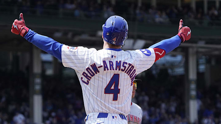 Jun 1, 2025; Chicago, Illinois, USA; Chicago Cubs outfielder Pete Crow-Armstrong (4) gestures after hitting a one run single against the Cincinnati Reds during the third inning at Wrigley Field. 