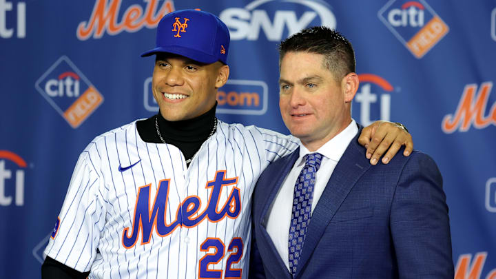 Dec 12, 2024; Flushing, NY, USA; New York Mets right fielder Juan Soto poses for photos with manager Carlos Mendoza during a press conference at Citi Field. Mandatory Credit: Brad Penner-Imagn Images