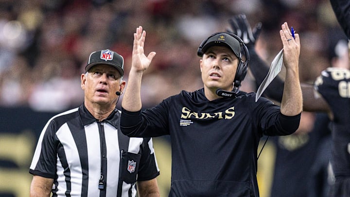 Sep 14, 2025; New Orleans, Louisiana, USA; New Orleans Saints head coach Kellen Moore reacts to a touchdown against the San Francisco 49ers during the first half at Caesars Superdome. Mandatory Credit: Stephen Lew-Imagn Images Sep 14, 2025; New Orleans, Louisiana, USA; New Orleans Saints head coach Kellen Moore reacts to a touchdown against the San Francisco 49ers during the first half at Caesars Superdome. Mandatory Credit: Stephen Lew-Imagn Images