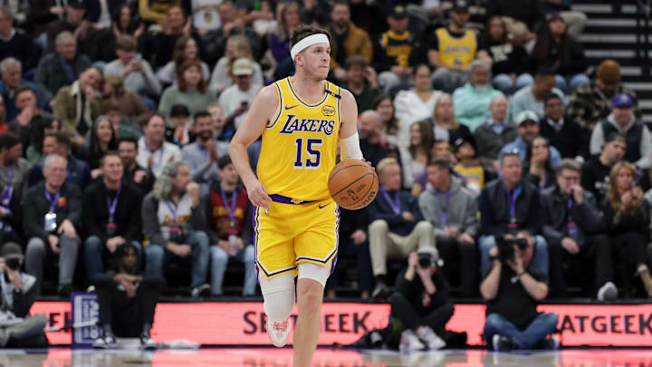 Feb 12, 2025; Salt Lake City, Utah, USA; Los Angeles Lakers guard Austin Reaves (15) dribbles against the Utah Jazz during the first quarter at Delta Center. Mandatory Credit: Chris Nicoll-Imagn Images
