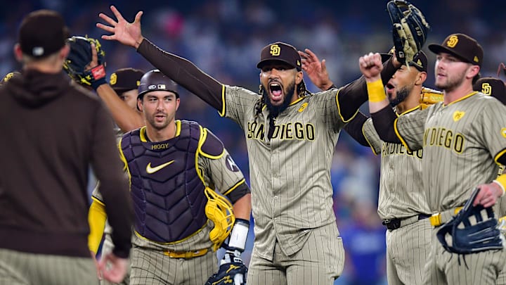 Sep 24, 2024; Los Angeles, California, USA; San Diego Padres and right fielder Fernando Tatis Jr. (23) celebrate the victory against the Los Angeles Dodgers and postseason berth at Dodger Stadium. Sep 24, 2024; Los Angeles, California, USA; San Diego Padres and right fielder Fernando Tatis Jr. (23) celebrate the victory against the Los Angeles Dodgers and postseason berth at Dodger Stadium.