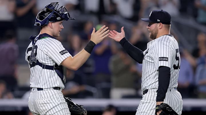 Aug 11, 2025; Bronx, New York, USA; New York Yankees catcher Ben Rice (22) and relief pitcher David Bednar (53) celebrate after defeating the Minnesota Twins during the ninth inning at Yankee Stadium. Mandatory Credit: Brad Penner-Imagn Images
