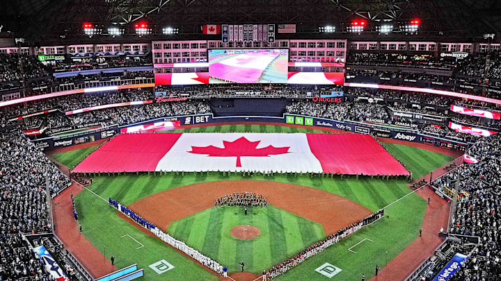 Mar 27, 2025; Toronto, Ontario, CAN; A general view of the Rogers Centre during the national anthem before the start of the opening day game between the Toronto Blue Jays and the Baltimore Orioles.